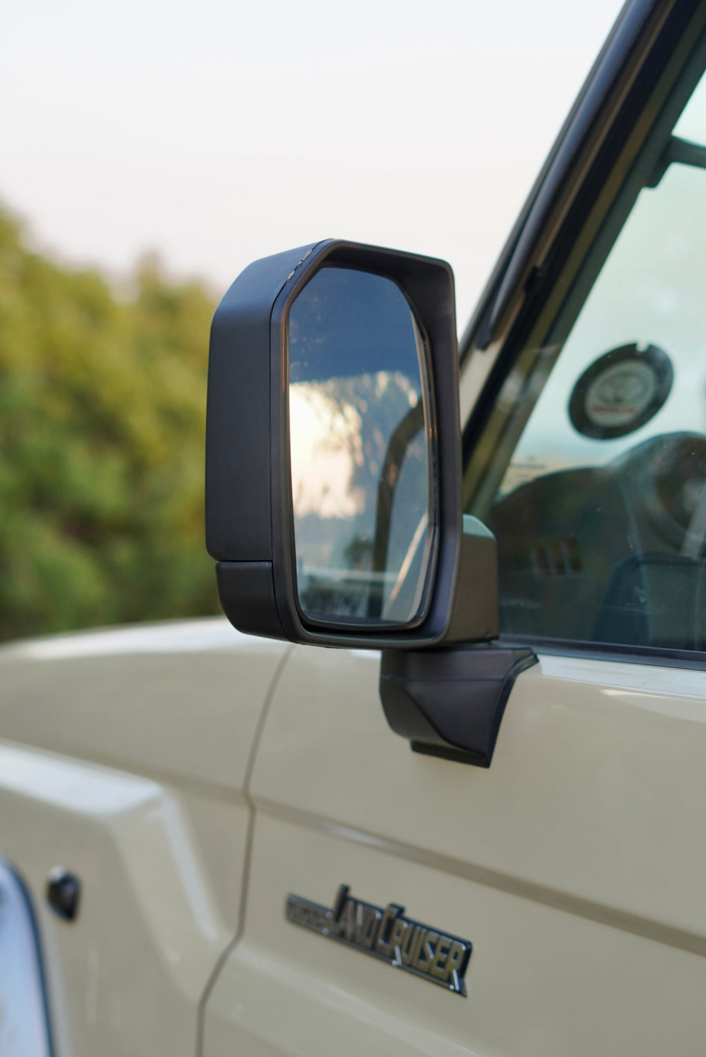 Side view mirror of a Toyota Land Cruiser