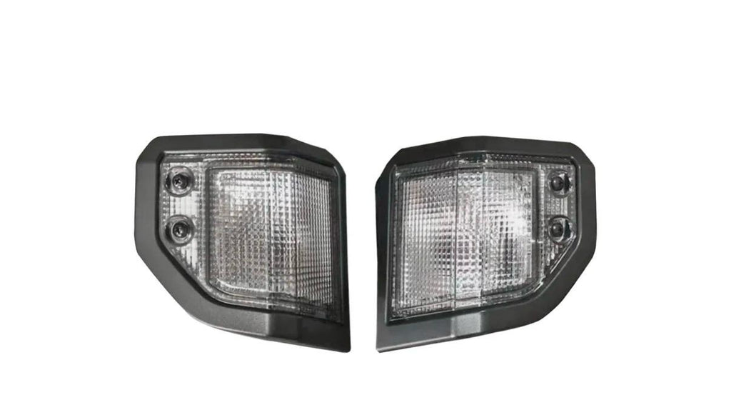 Two car side indicator lights on a white background for Toyota